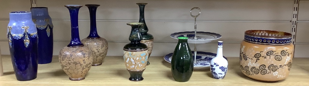 A quantity of mixed Royal Doulton ceramics - 8 vases, a cake stand and a flower pot